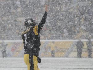 Dec 8, 2013; Pittsburgh, PA, USA; Pittsburgh Steelers quarterback Ben Roethlisberger (7) celebrates a touchdown against the Miami Dolphins during the first half at Heinz Field. Mandatory Credit: Jason Bridge-USA TODAY Sports