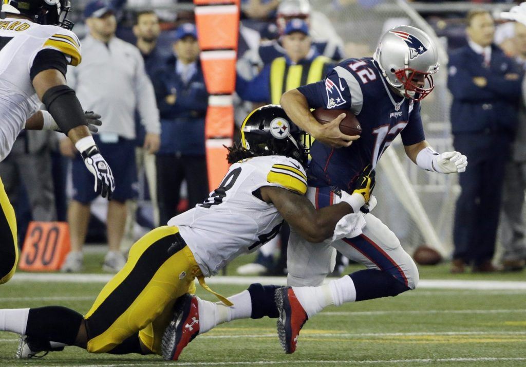 Pittsburgh Steelers linebacker Bud Dupree (48) tackles New England Patriots quarterback Tom Brady (12) in the first half of an NFL football game, Thursday, Sept. 10, 2015, in Foxborough, Mass. (AP Photo/Stephan Savoia)