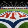 NFL 2018 – Az új ligaév kezdete A general view of the NFL Experience and the NFL Shield on an indoor field is seen at the NFL football scouting combine on Thursday, March 2, 2017, in Indianapolis. (Aaron M. Sprecher via AP)